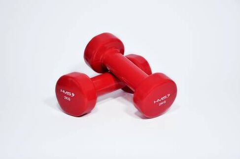 Basic breast augmentation exercises are performed with dumbbells