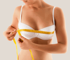 Girl measures bust with inches
